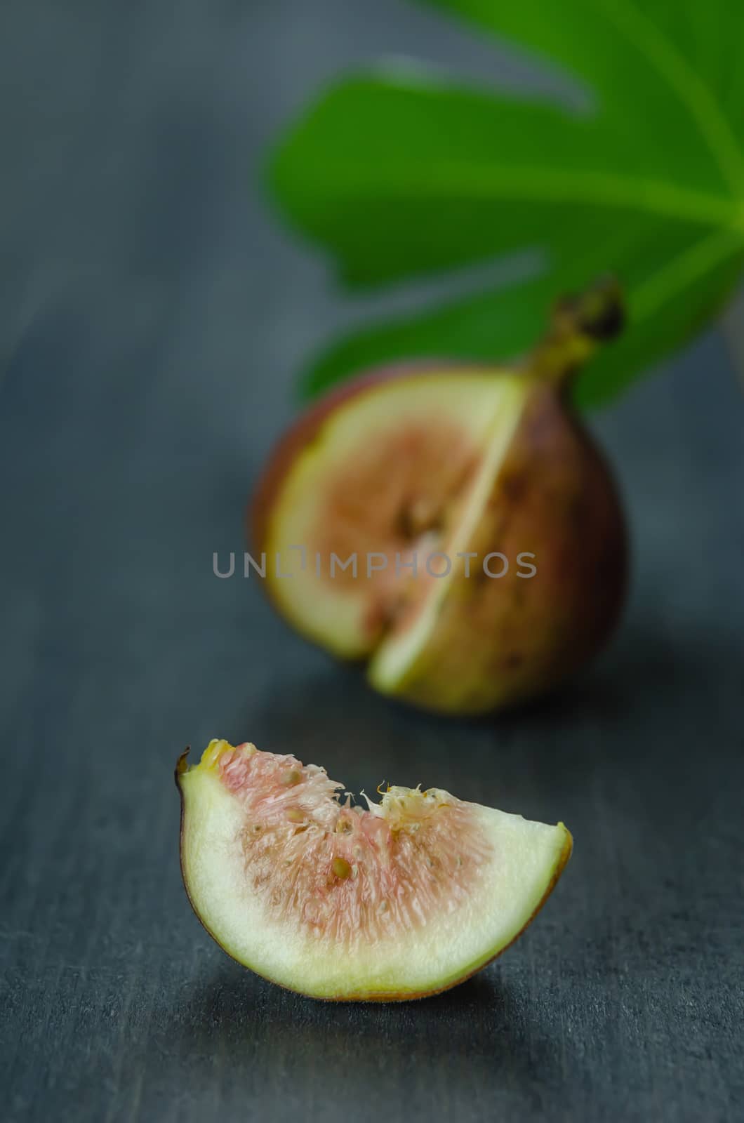 Portion of fresh Figs on wooden background