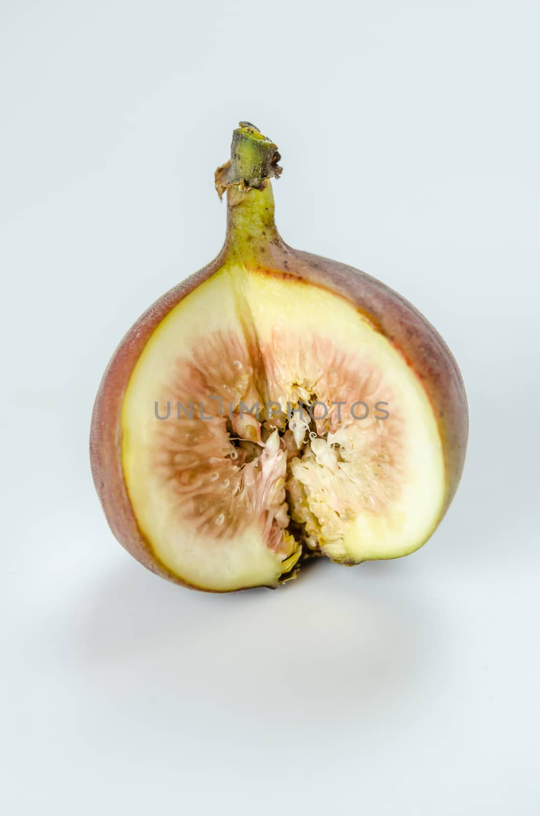 sliced fresh figs fruit on white background