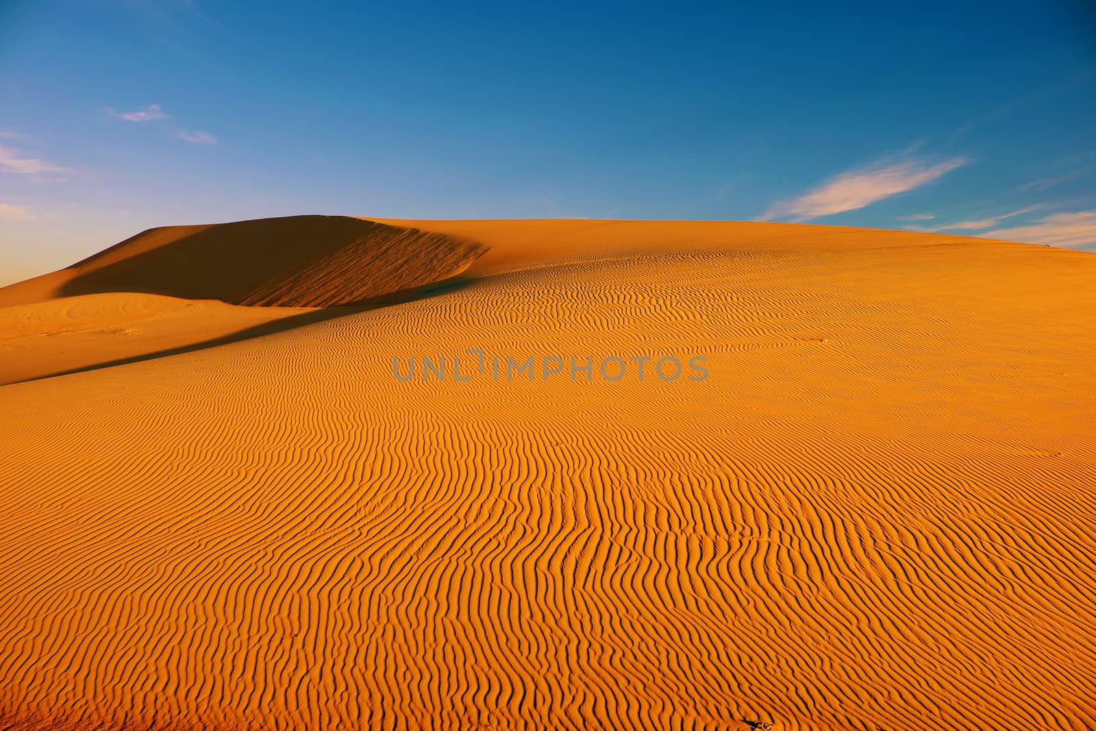 Wonderful landscape for Vietnam travel, abstract with shape of Bau Trang sand hill under sky in summer, a beautiful place for tourism, sand desert so amazing