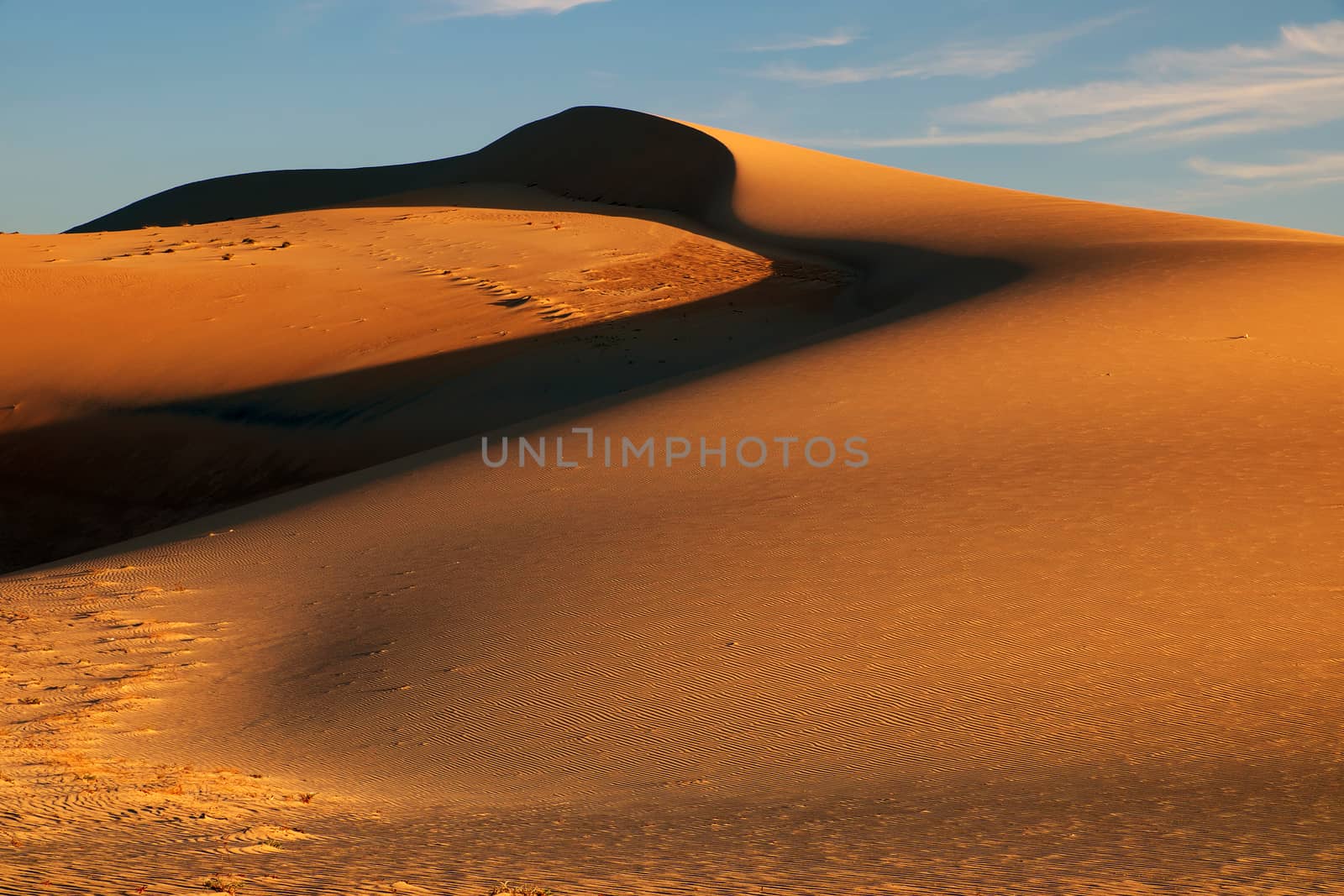 Wonderful landscape for Vietnam travel, abstract with shape of Bau Trang sand hill under sky in summer, a beautiful place for tourism, sand desert so amazing