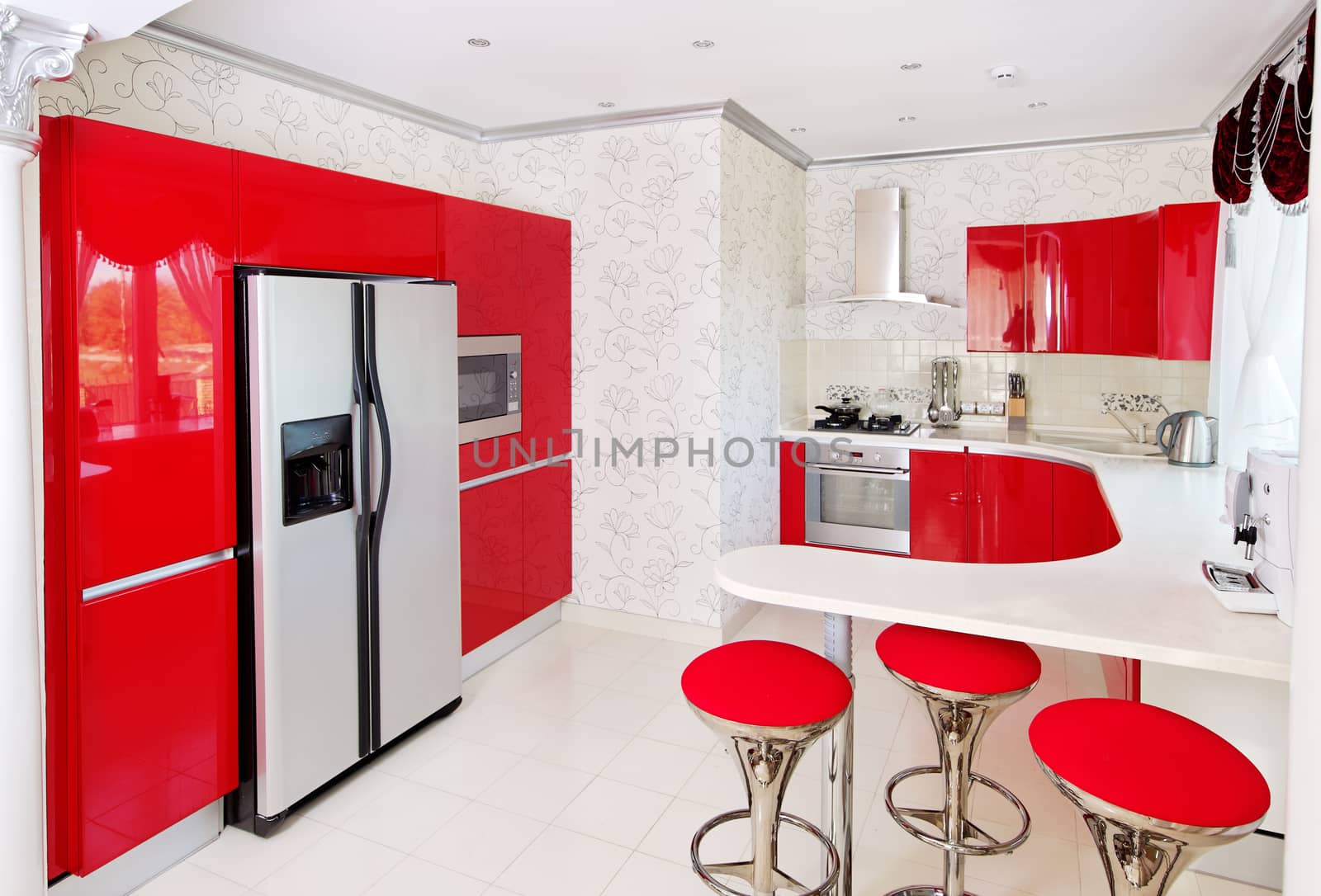 Modern red glossy kitchen interior 