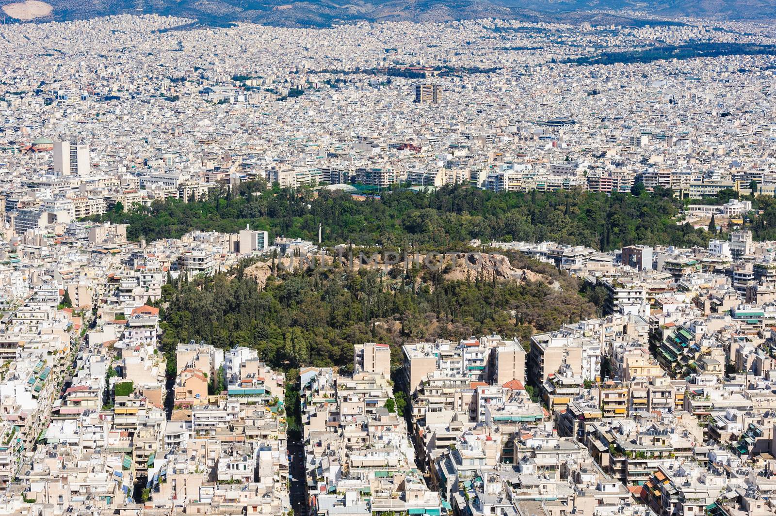 Athens Greece - April 27, 2016: Famous view from Lycabettus hill to modern city with Acropolis ans sea at background