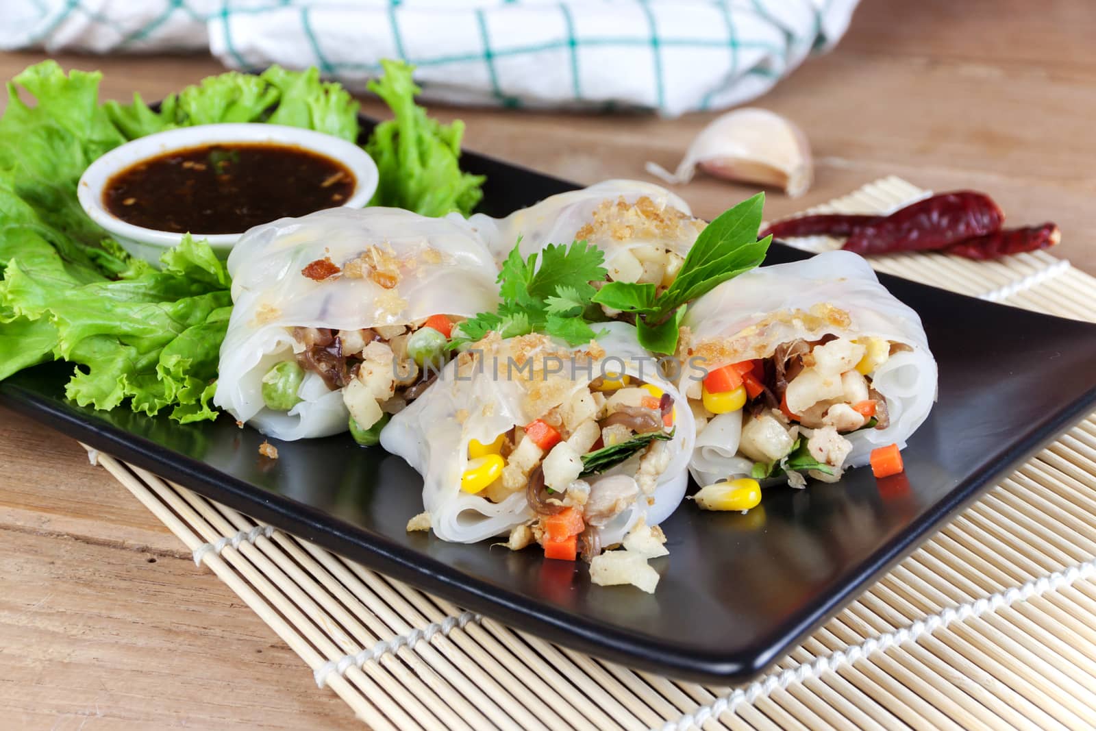 Noodle tube is appetizer menu Asia. made from noodle stuffed with pork and vegetables cooking by steamed.