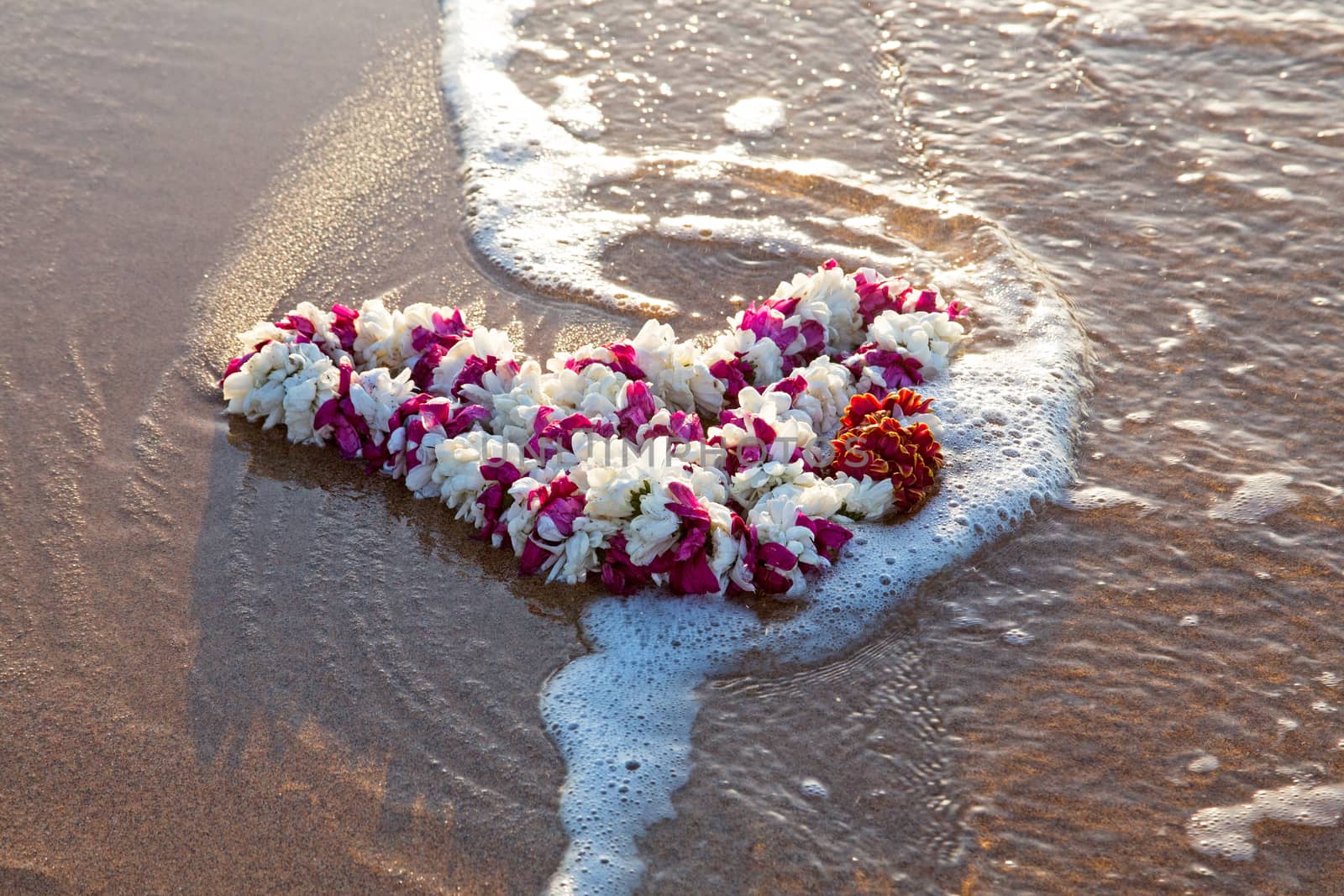 Garland on the beach at the ocean