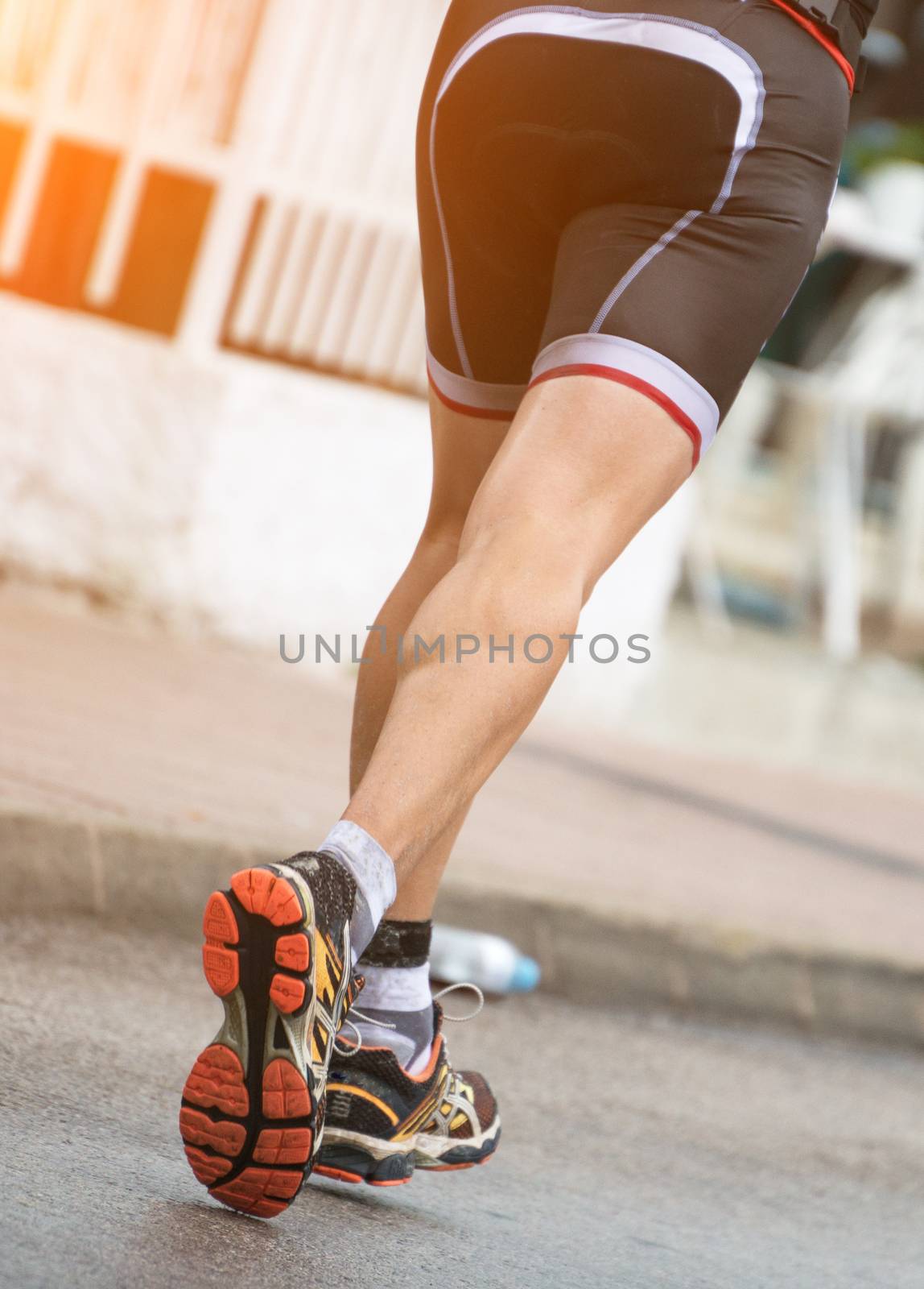 Racewalking. Marathon runner on the street.