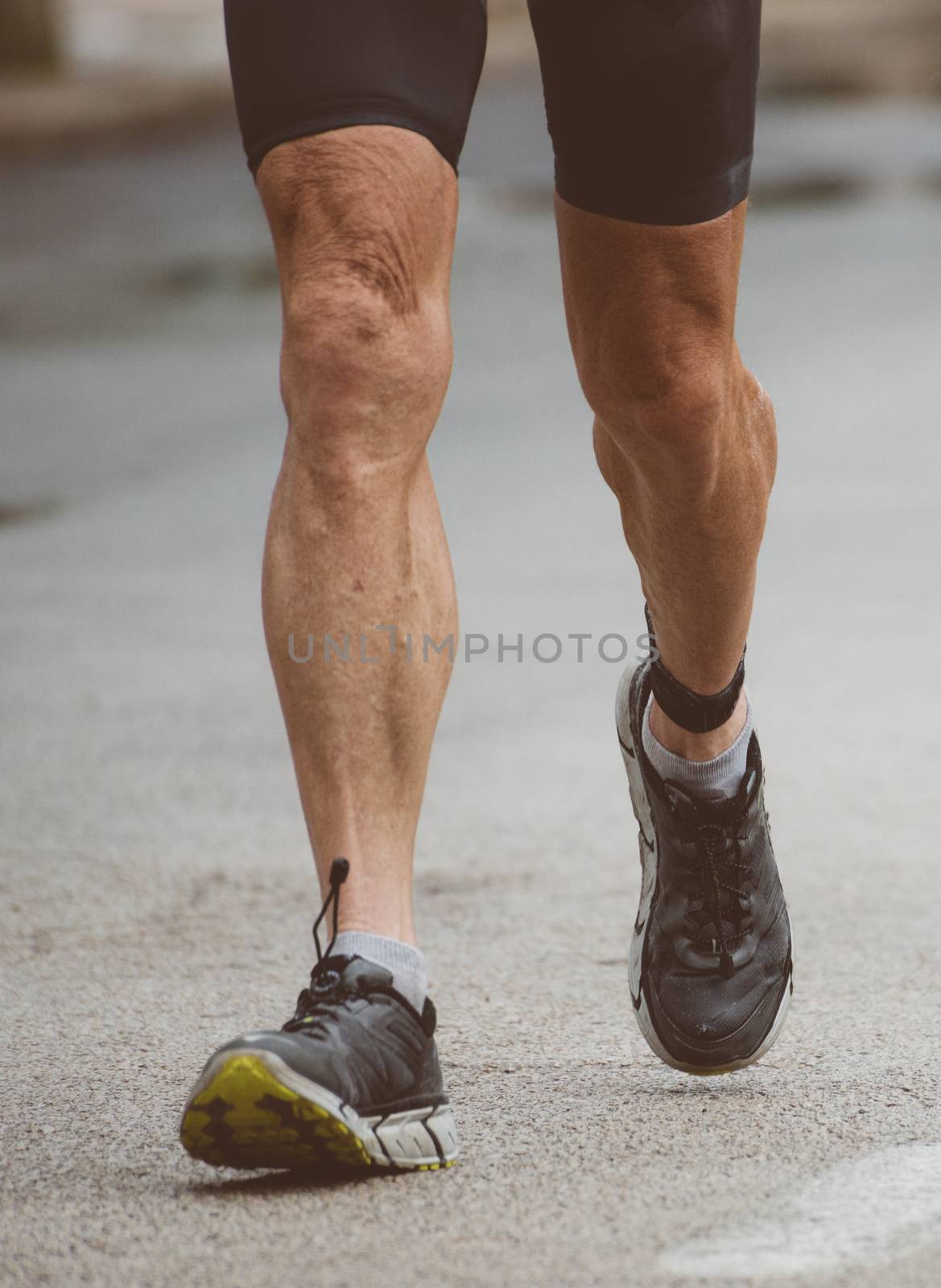 Racewalking. Marathon runner on the street.
