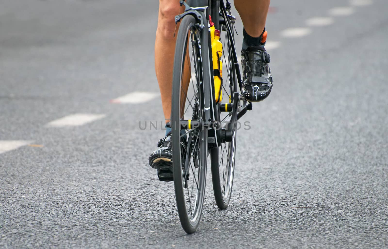 Unrecognizable professional cyclist during the bicycle competition.