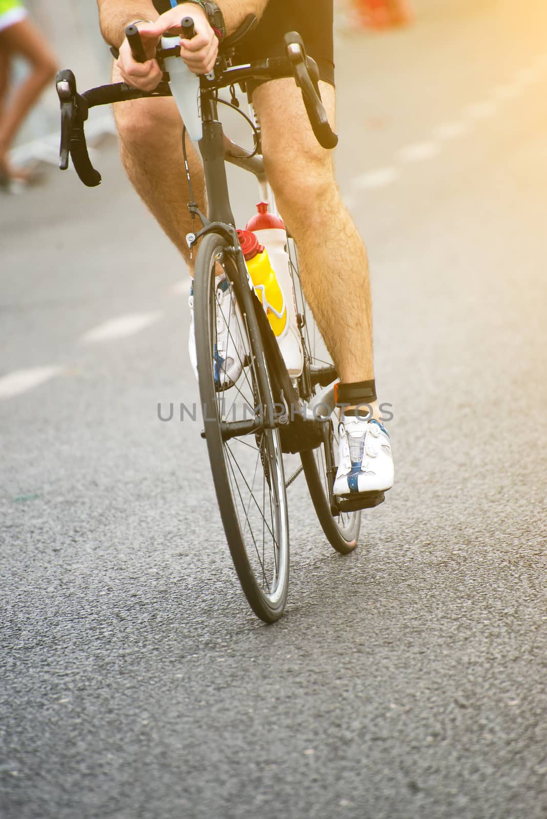 Unrecognizable professional cyclist during the bicycle competition.