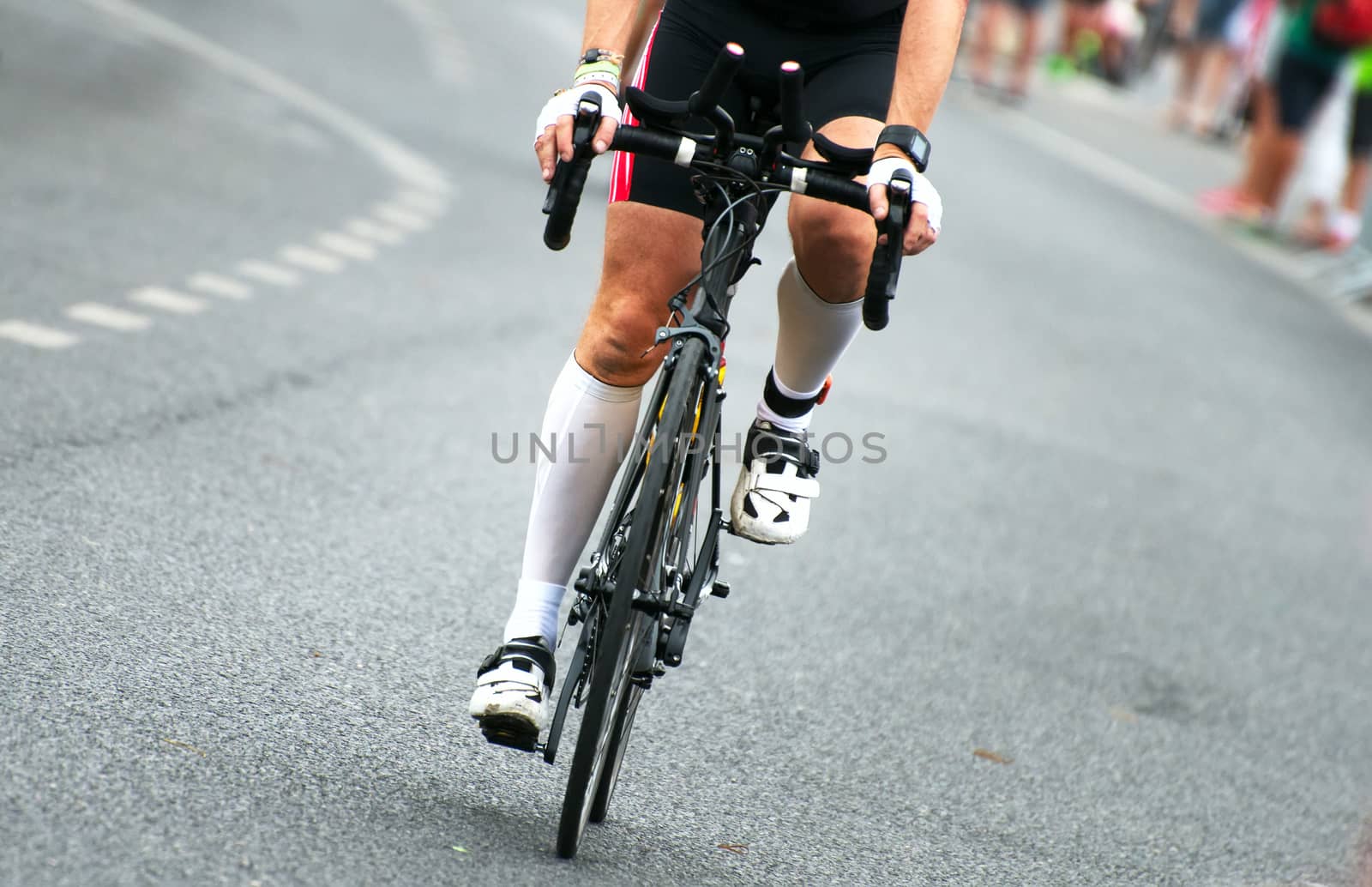 Unrecognizable professional cyclist during the bicycle competition.