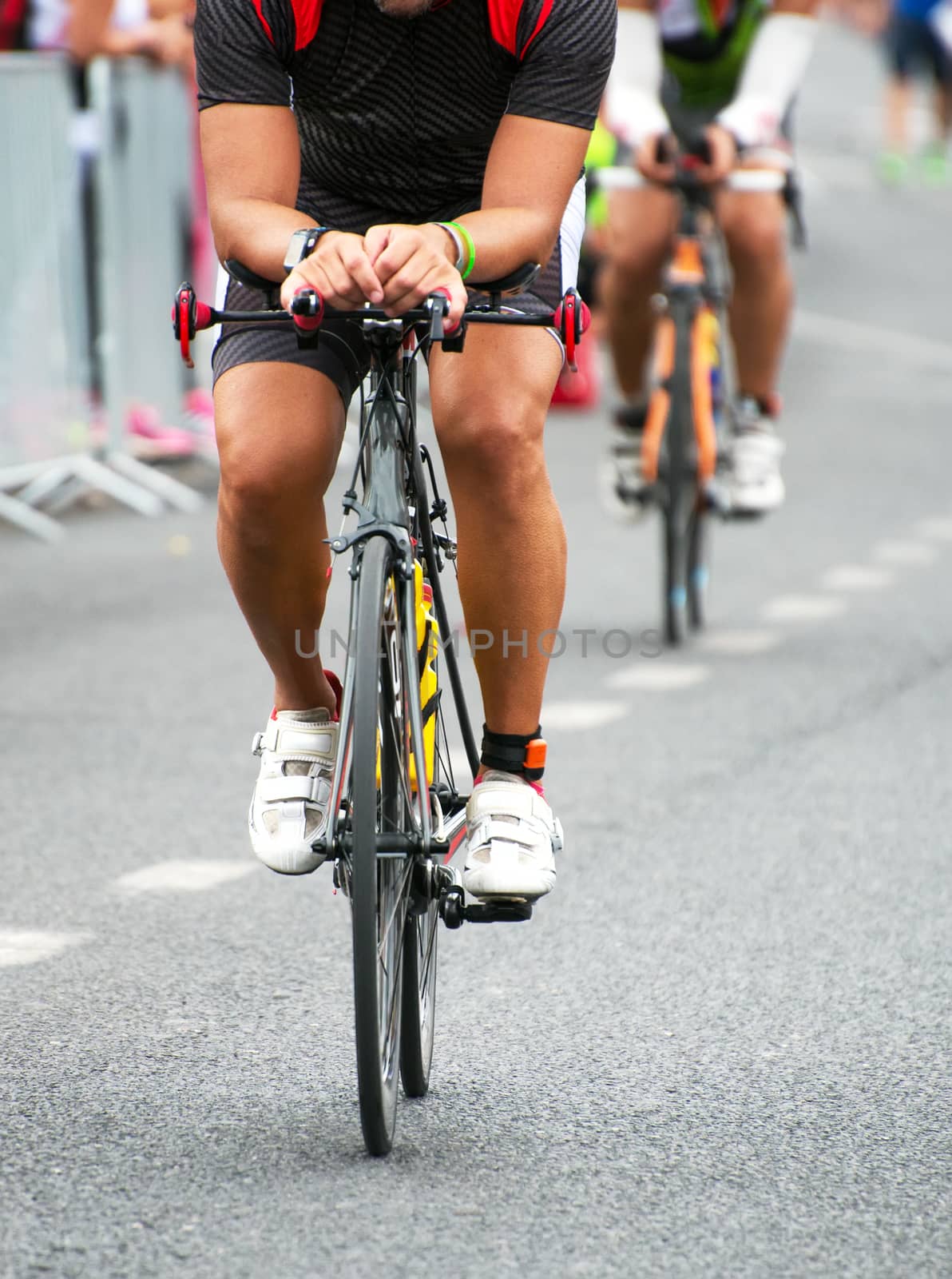 Unrecognizable professional cyclists during the bicycle competition.