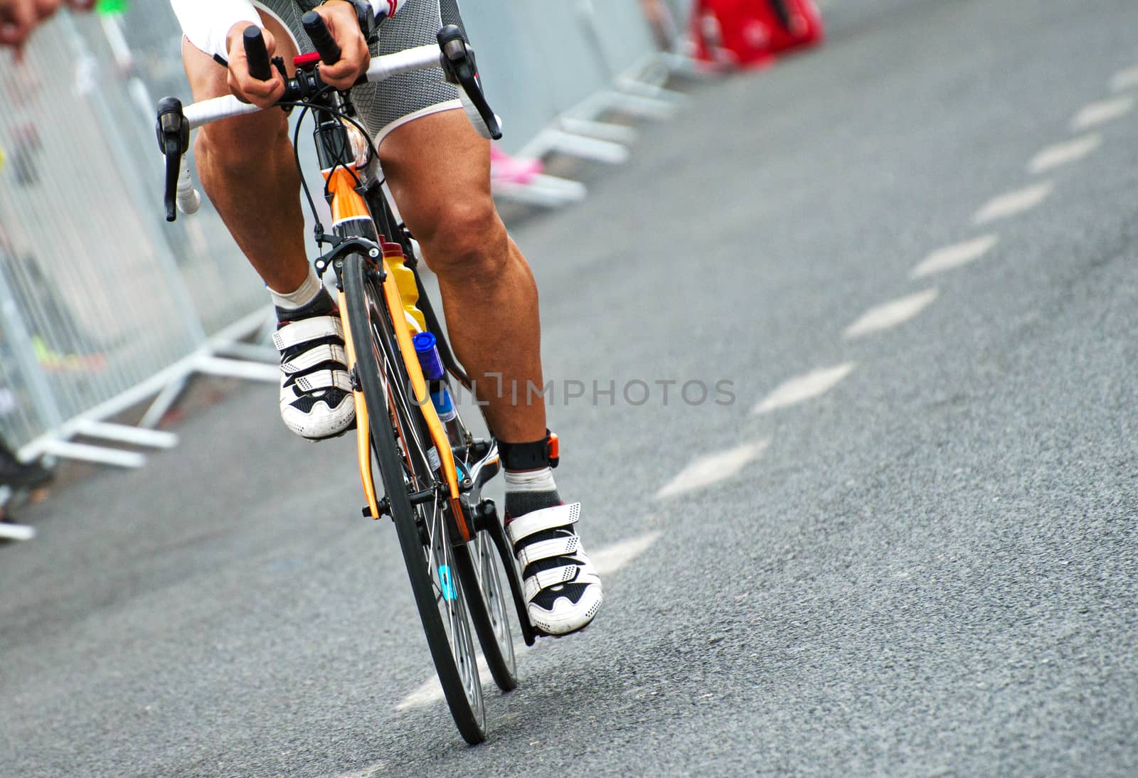 Unrecognizable professional cyclist during the bicycle competition.