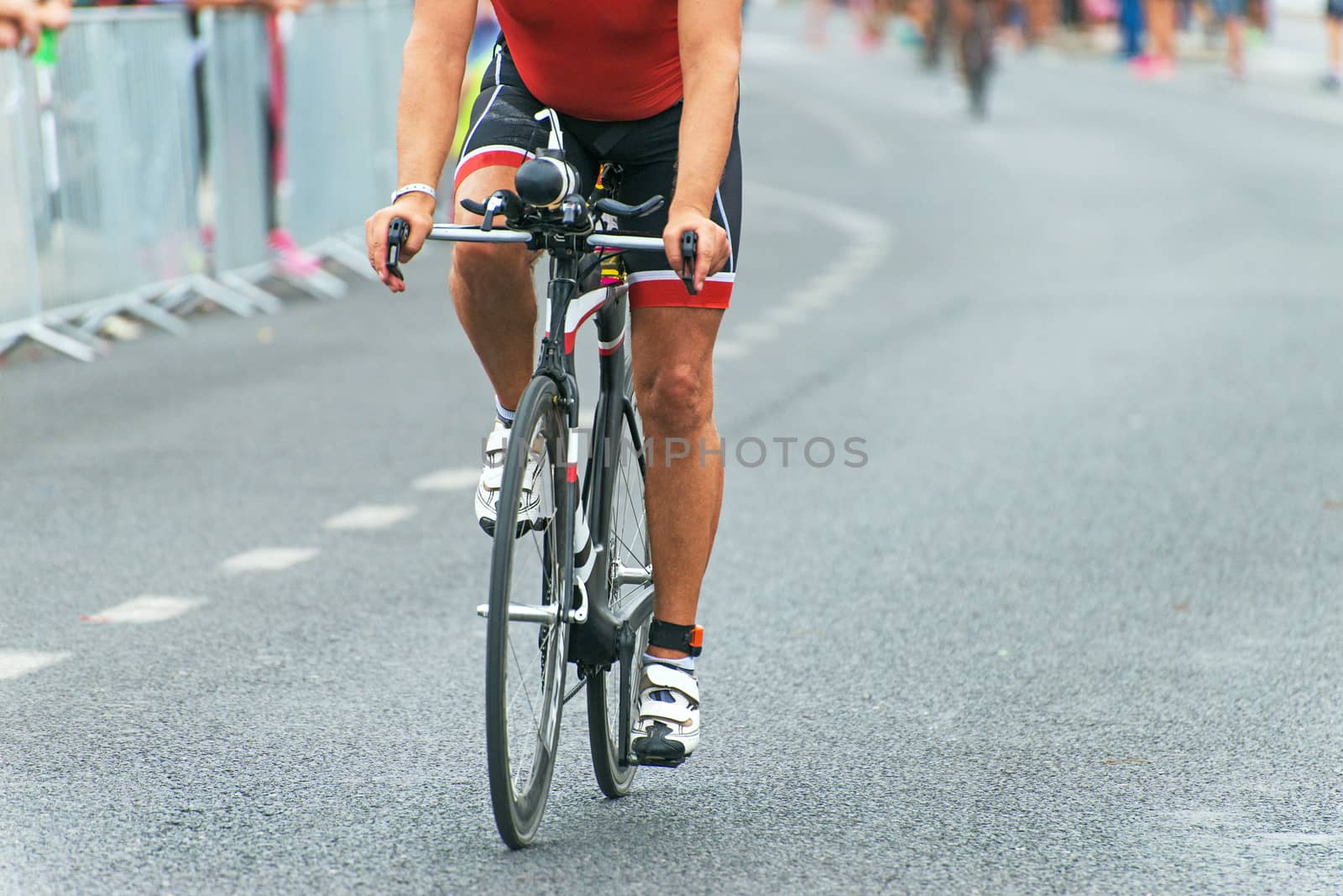 Unrecognizable professional cyclist during the bicycle competition.