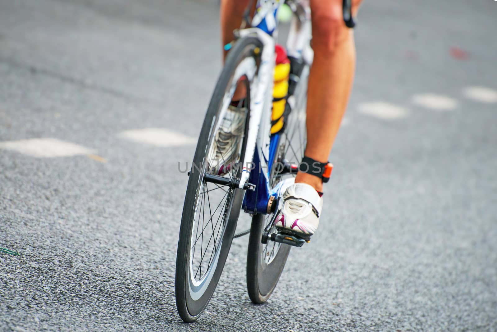 Unrecognizable professional cyclist during the bicycle competition.