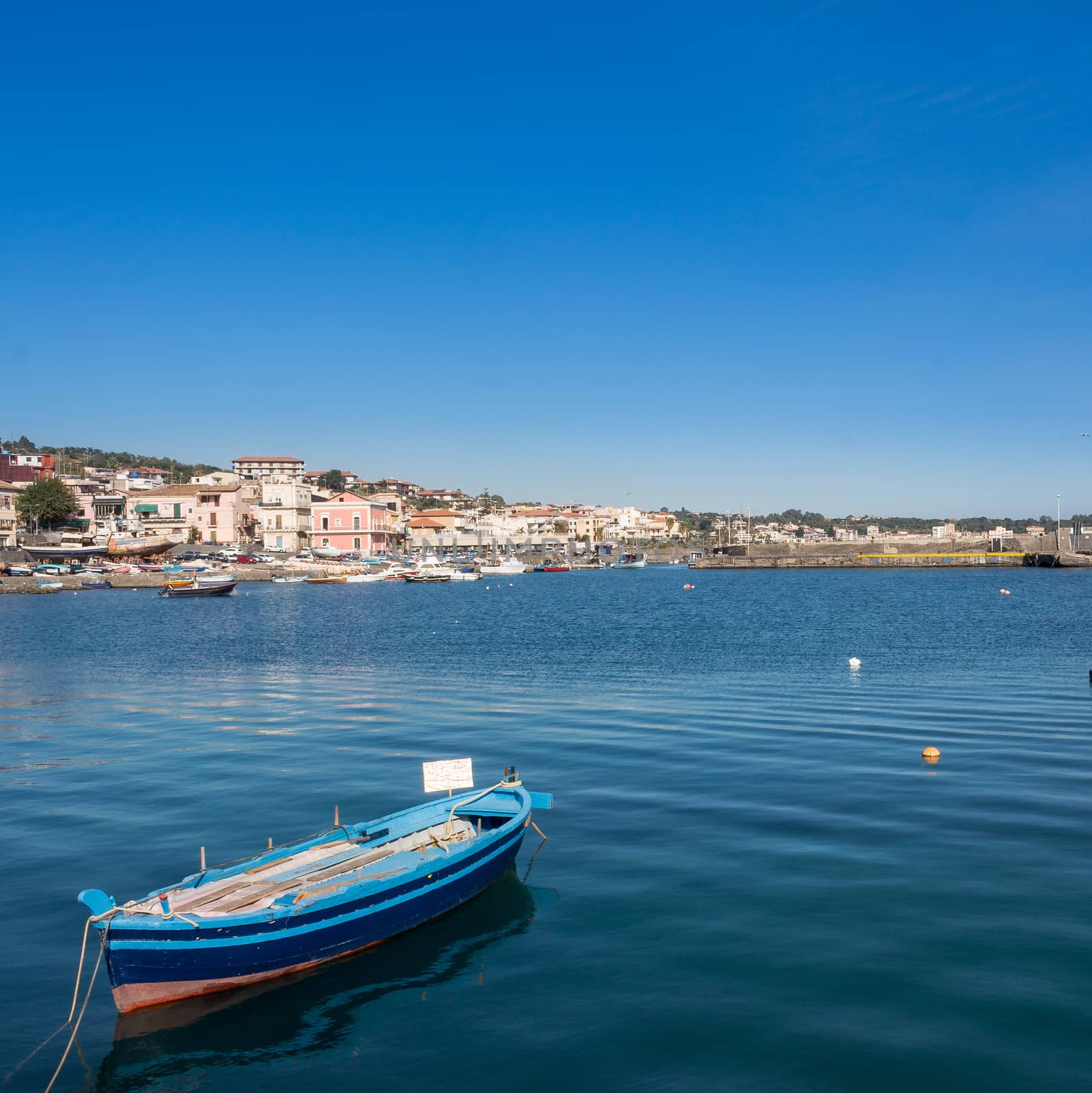 The small boat in the sicilian marina.