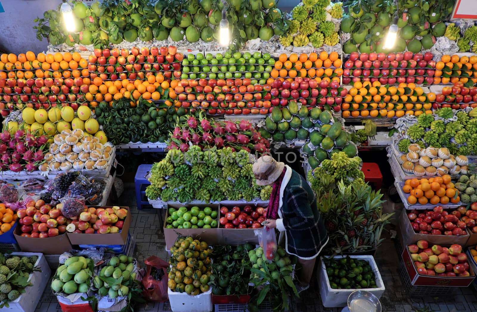 Colorful of fruit shop at Dalat marketplace, Vietnam, many kind of fresh tropical fruits arrange so amazing, agriculture product at farmer market