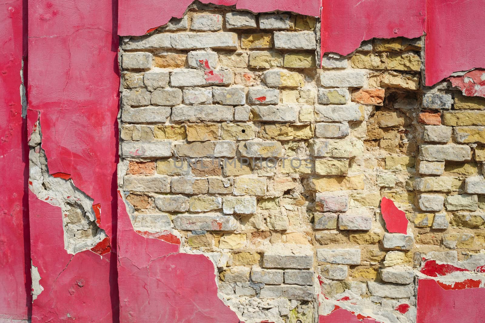red ruined plaster wall of bricks by timonko