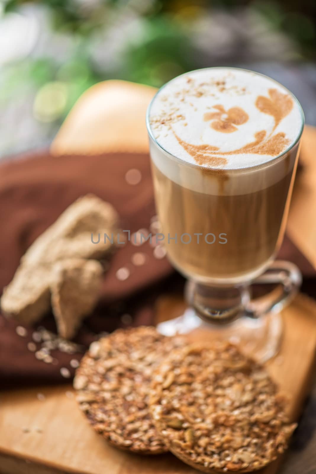 coffee latte cup with cookies closeup