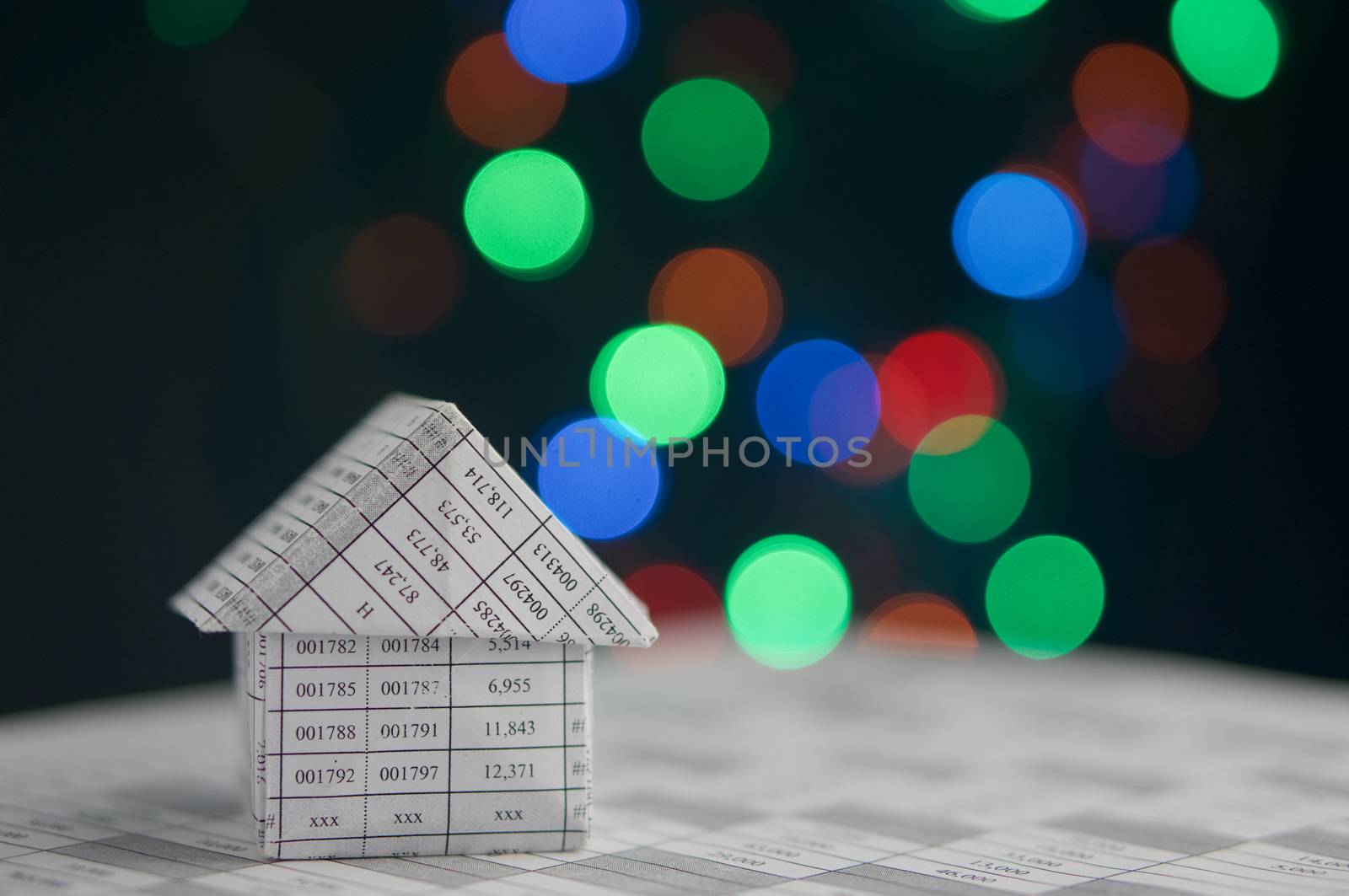 House on finance account has colorful bokeh as background by eaglesky