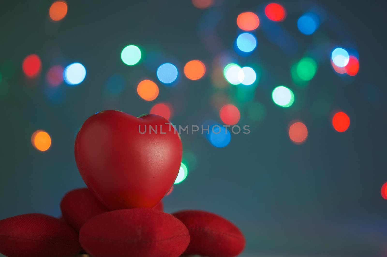 Red hearts have colorful bokeh circle as background by eaglesky