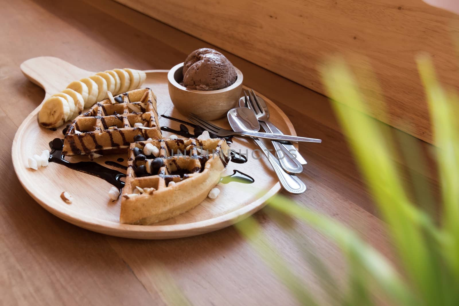 Belgian waffles with fruit and chocolate, forest fruit, all homemade, delicious batter