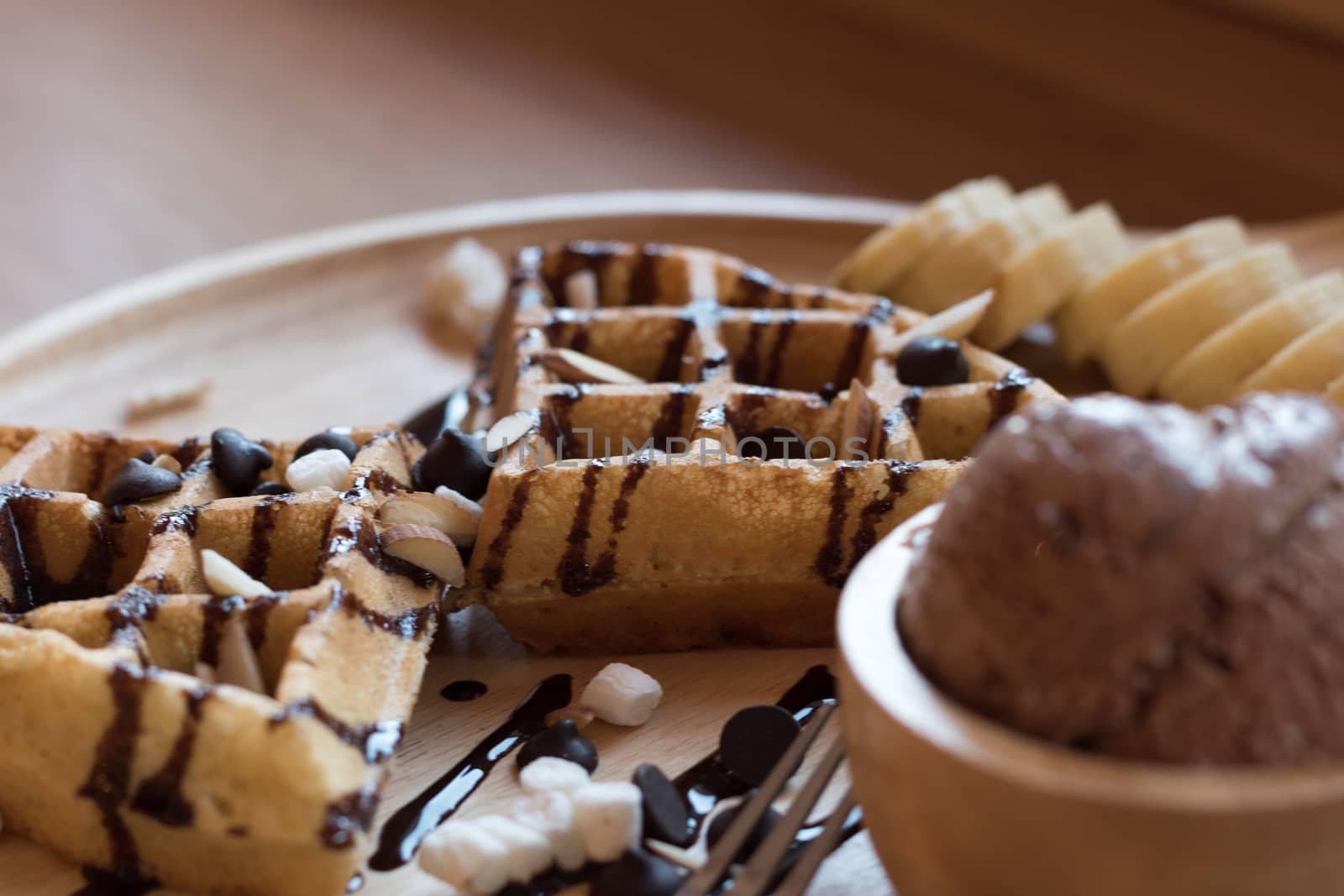 Belgian waffles with fruit and chocolate, forest fruit, all homemade, delicious batter