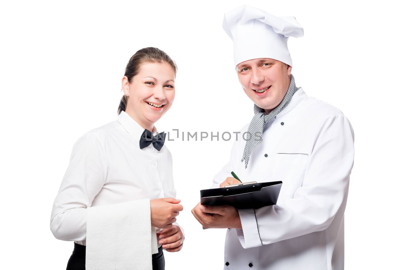 Chef with a folder and a waiter with a towel smiling on a white background in the studio