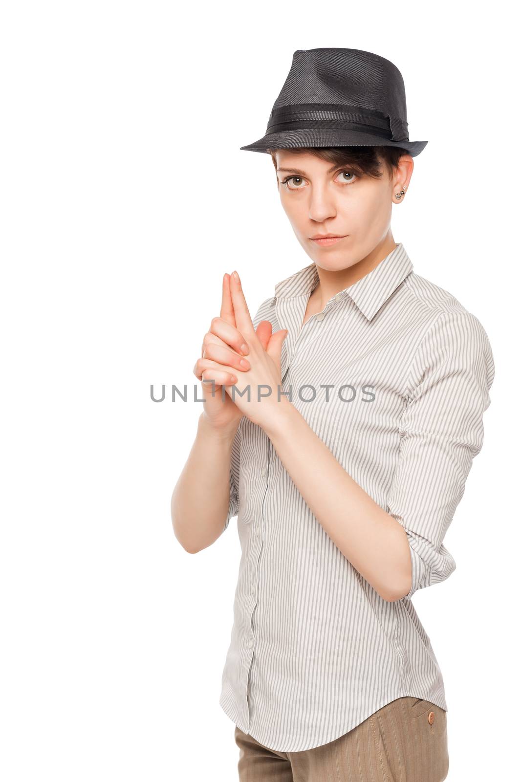 Detective woman thumbs gun on a white background isolated by kosmsos111