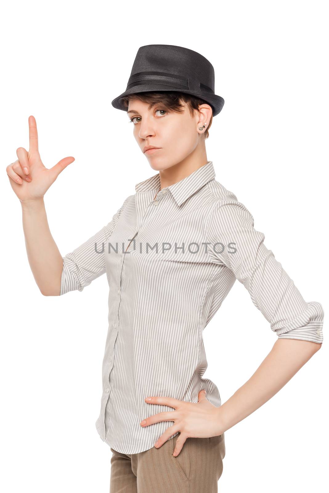 woman in black hat keeps fingers gun on a white background by kosmsos111