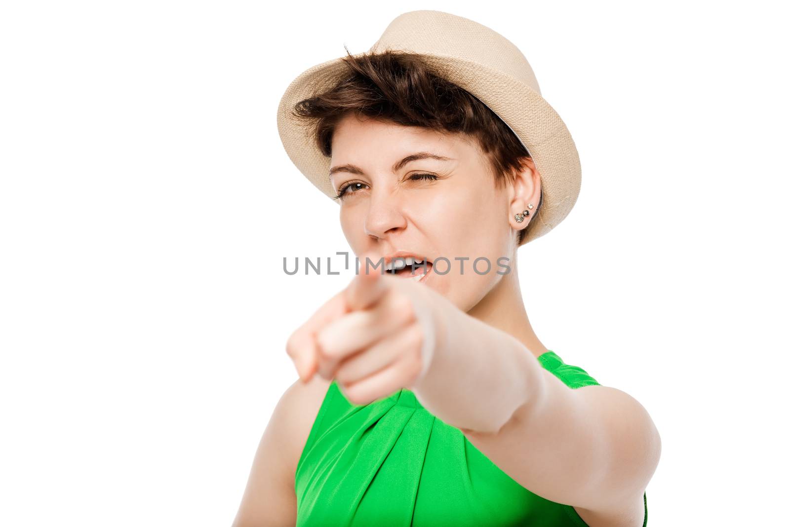 girl in the hat picks you up on a white background posing