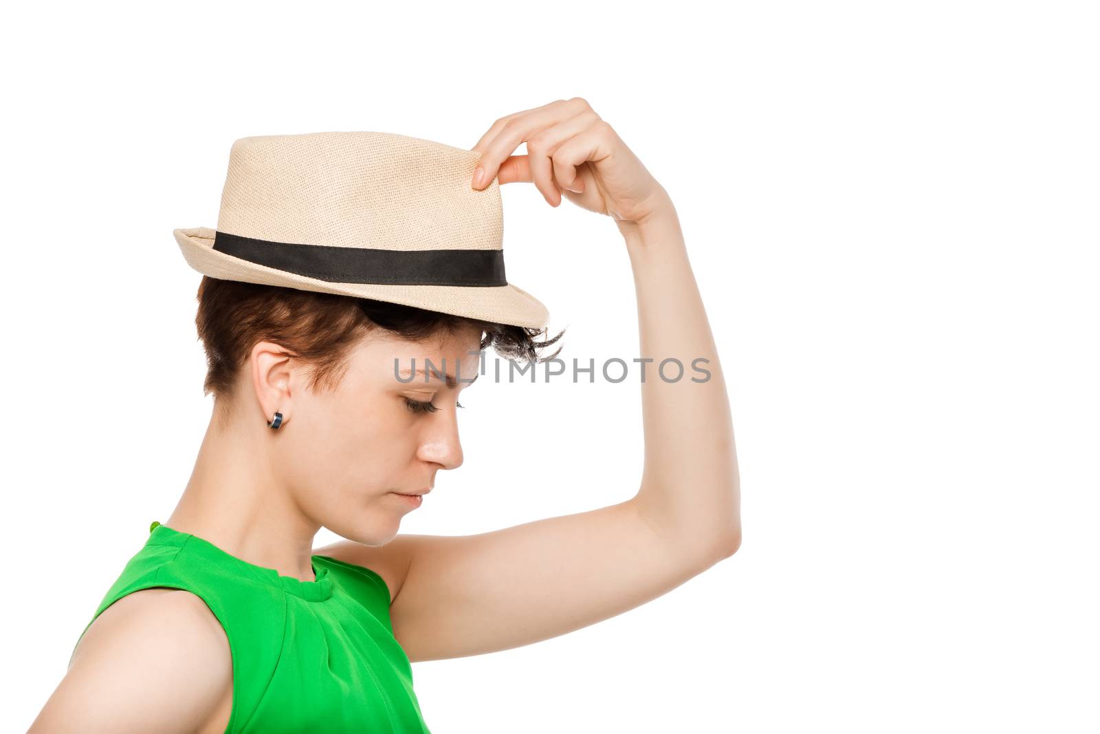 woman in a hat and space on the right on a white background