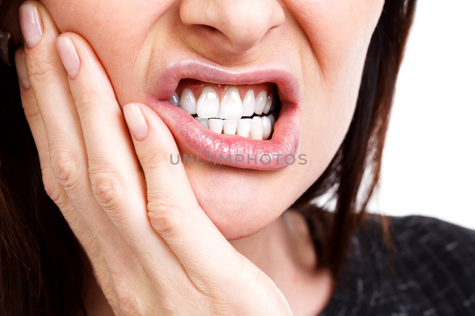 Woman with a toothpain, isolated on white background by Nobilior