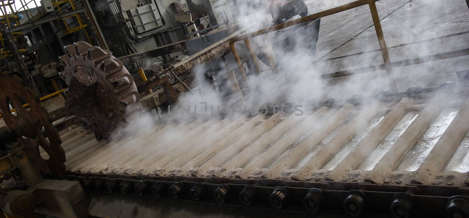 Stack of raw aluminum ingots in aluminum profiles factory, France