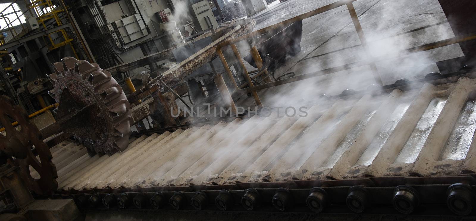 Stack of raw aluminum ingots in aluminum profiles factory, France