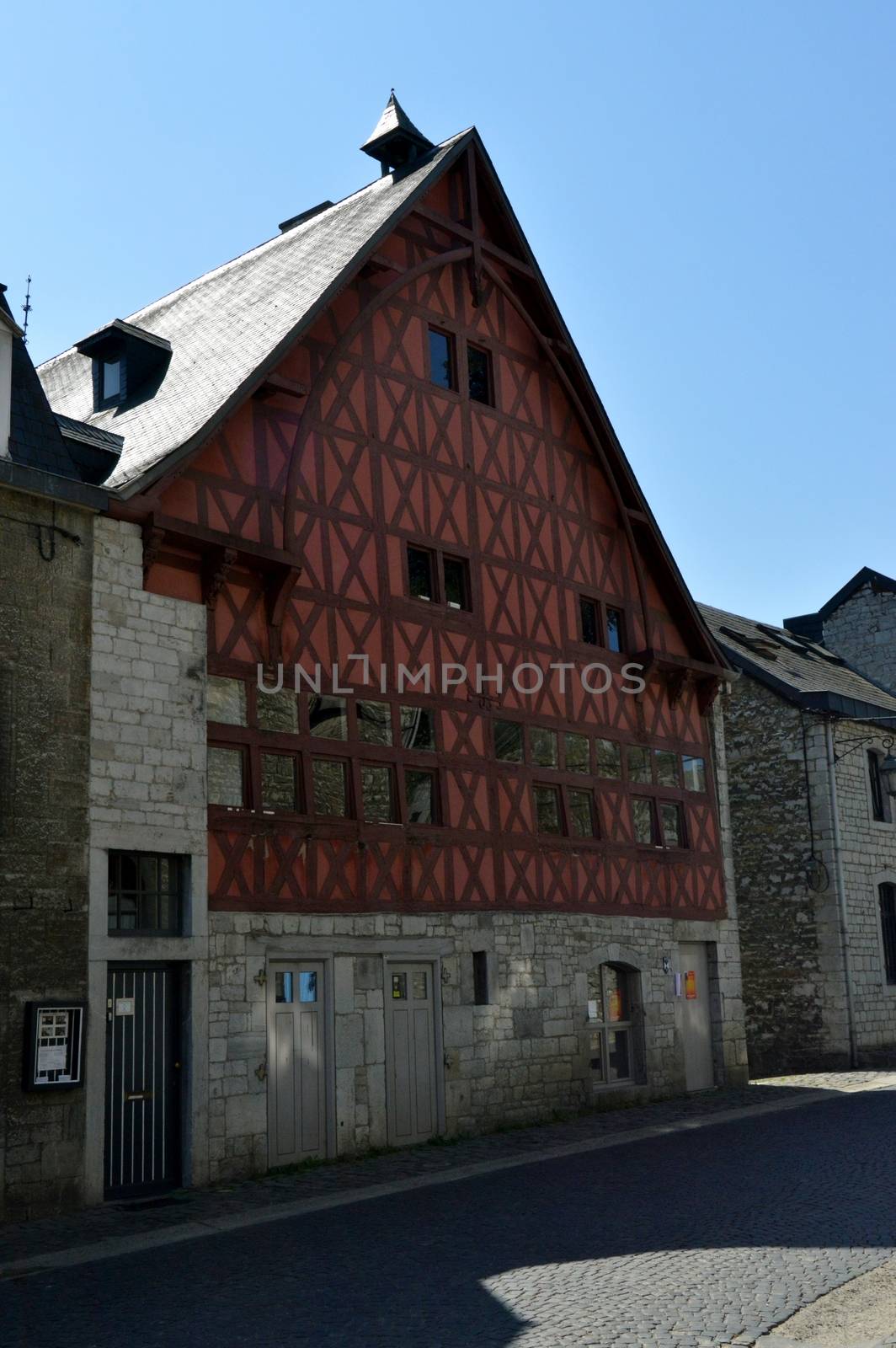 White facade with doors and wooden windows by Philou1000