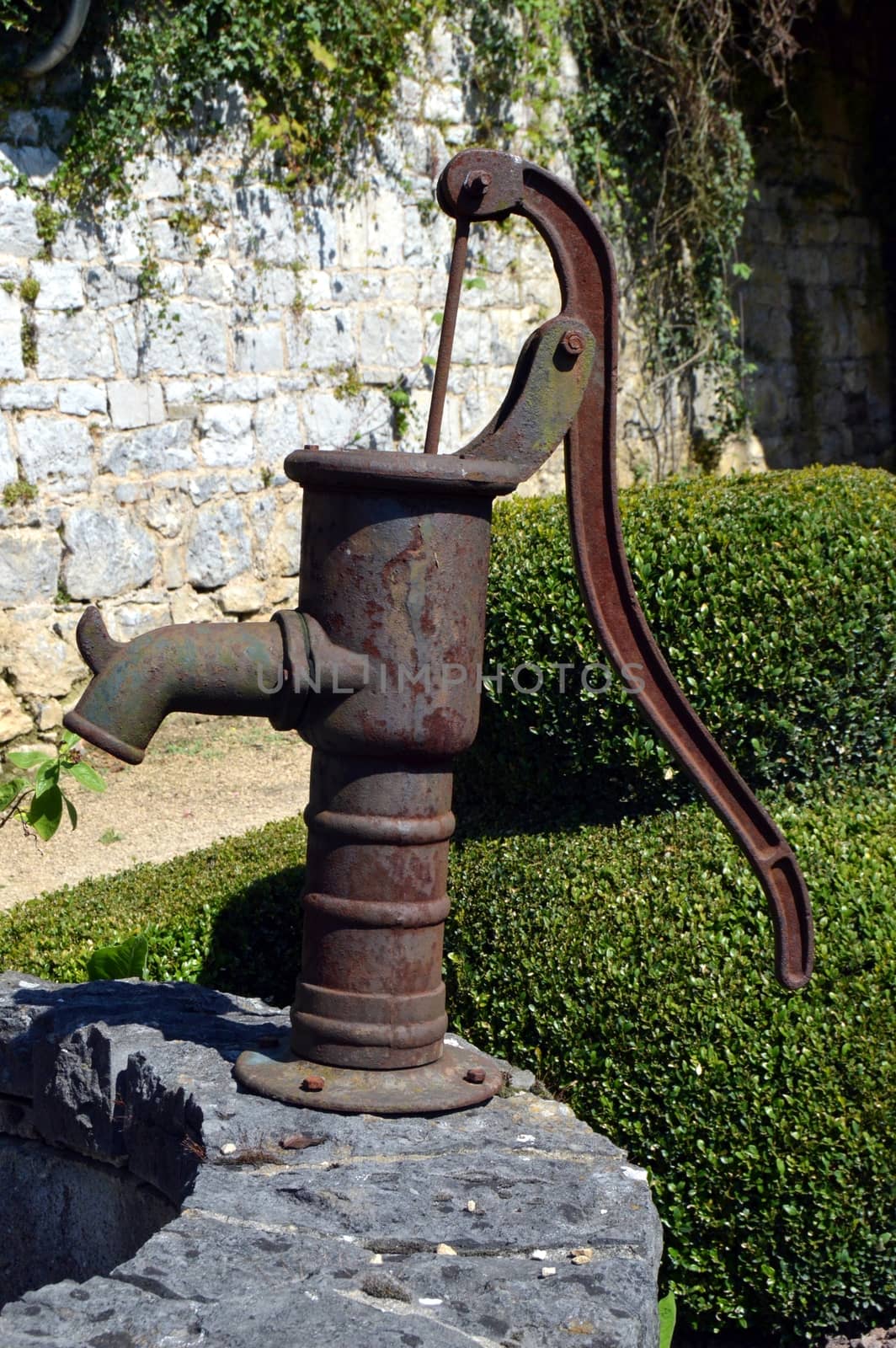 Old water pump in metal. by Philou1000