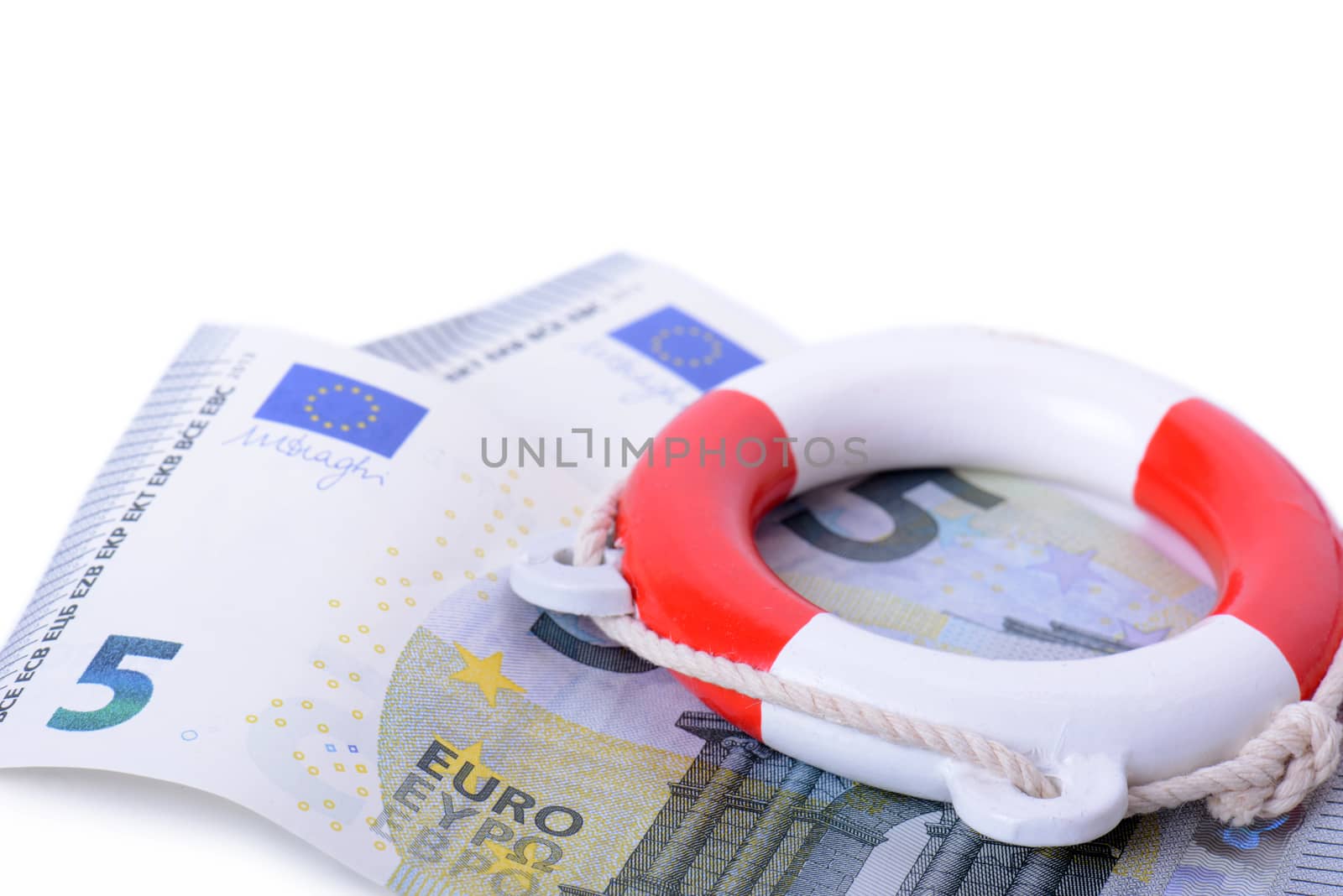 a life ring on euro notes, concept for saving the euro currency