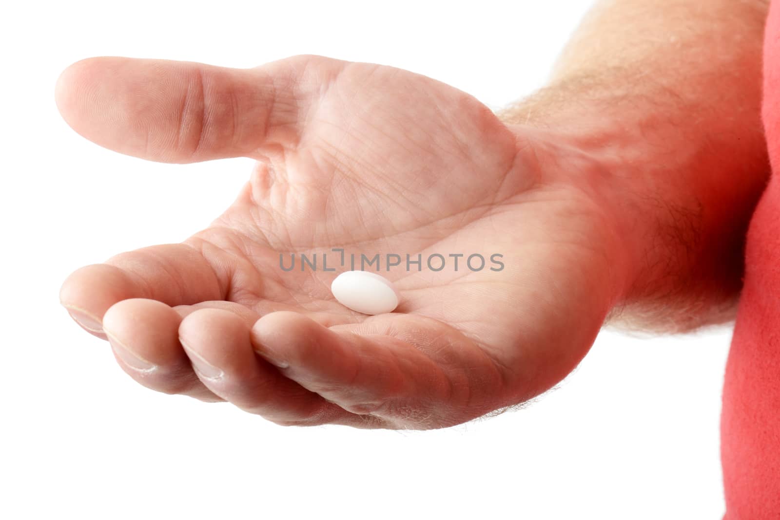 A Hand holding a white pill by hyrons