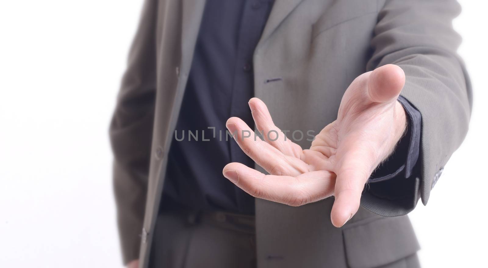 Giving a helping hand, asking or offering help close-up shot of a caucasian man in a business suit