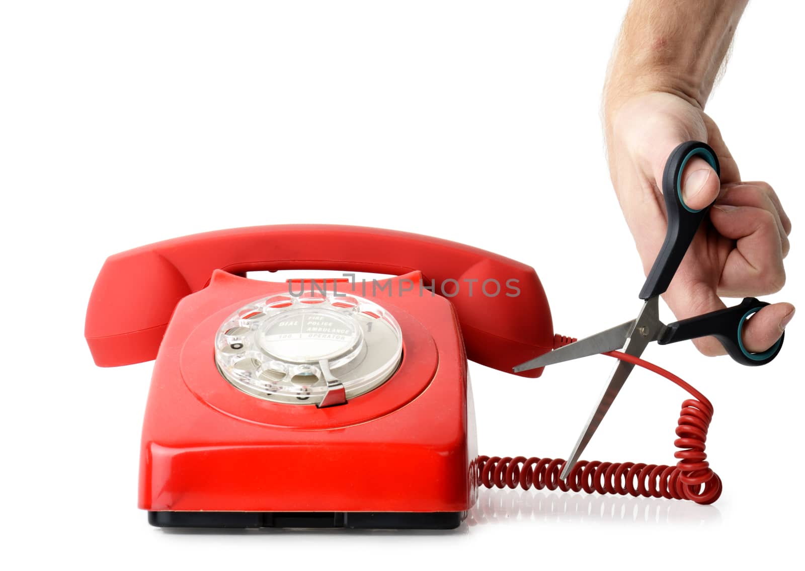 Cutting telephone cord isolated on a white background