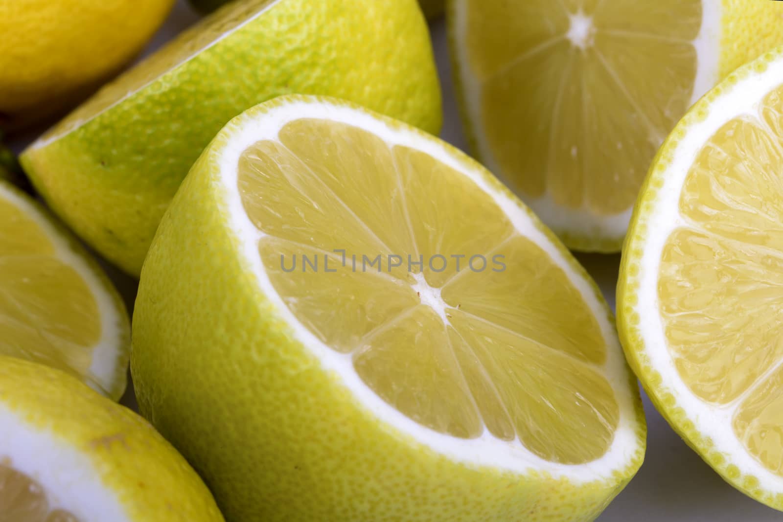 Cut lemons and isolated with white background