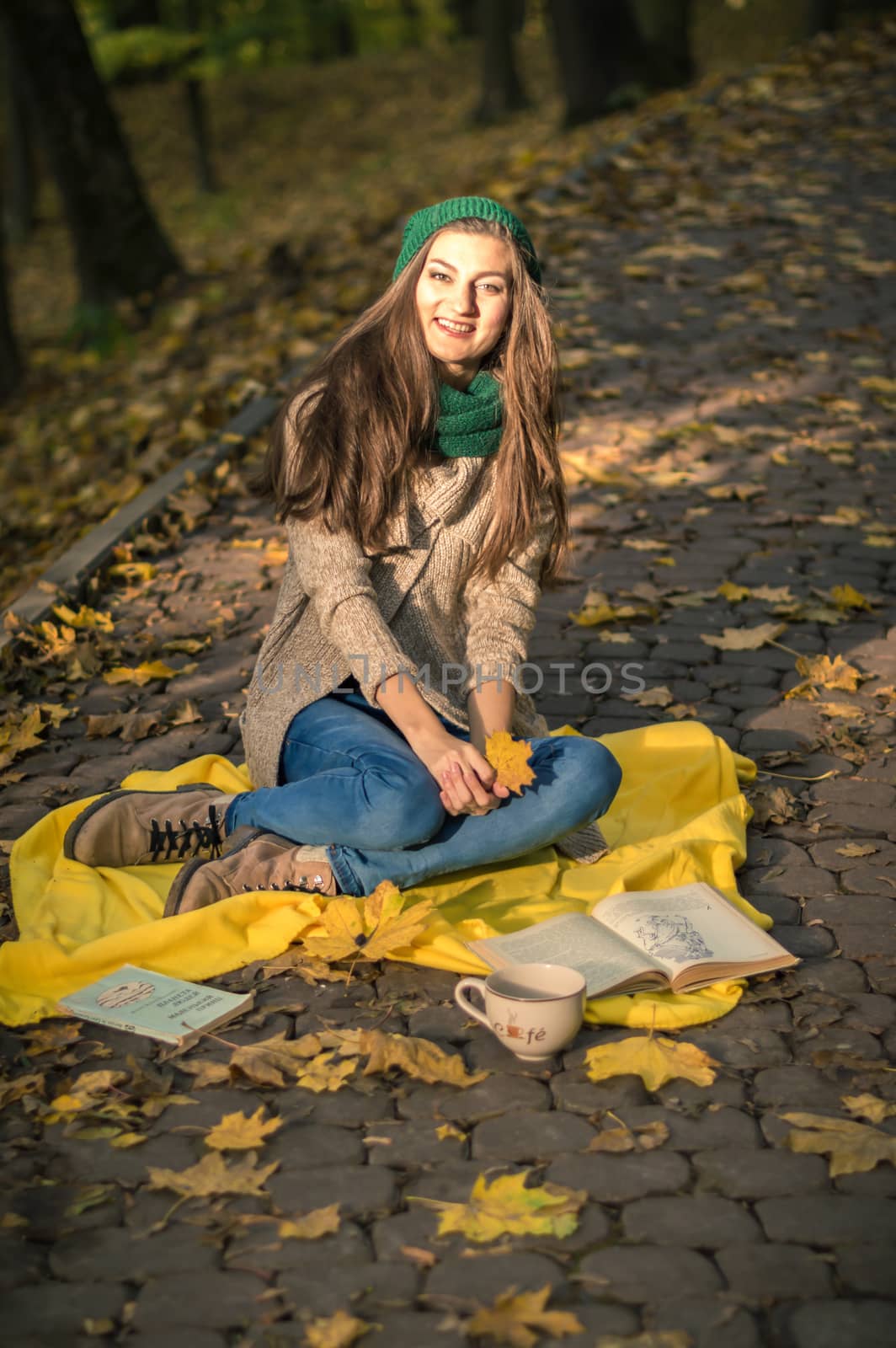 girl sitting on the track in the Park