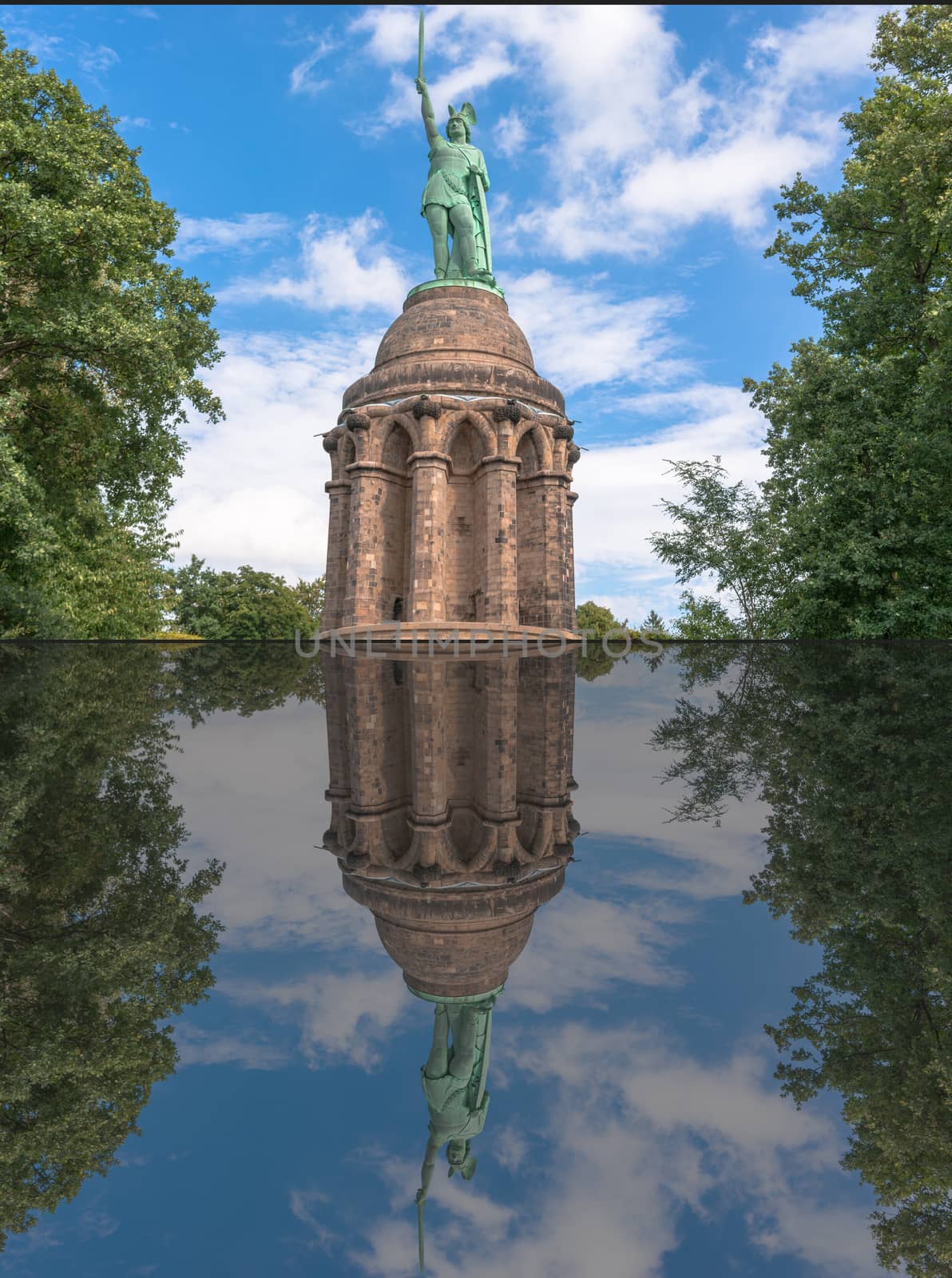 Reflection of the statue of the Cherusque prince Arminius in the Teutoburg Forest near the town of Detmold, Germany.