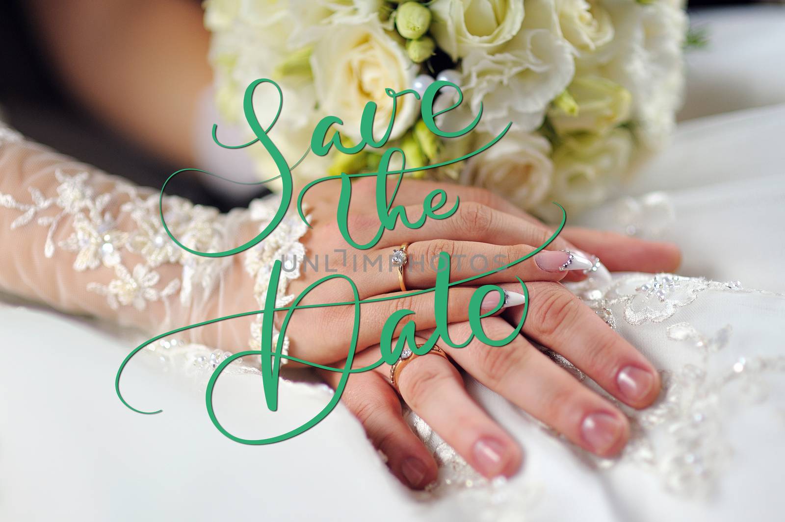 Wedding Flowers Bouquet in Bride Hands with White Dress on Background. words Save the Date. Calligraphy lettering