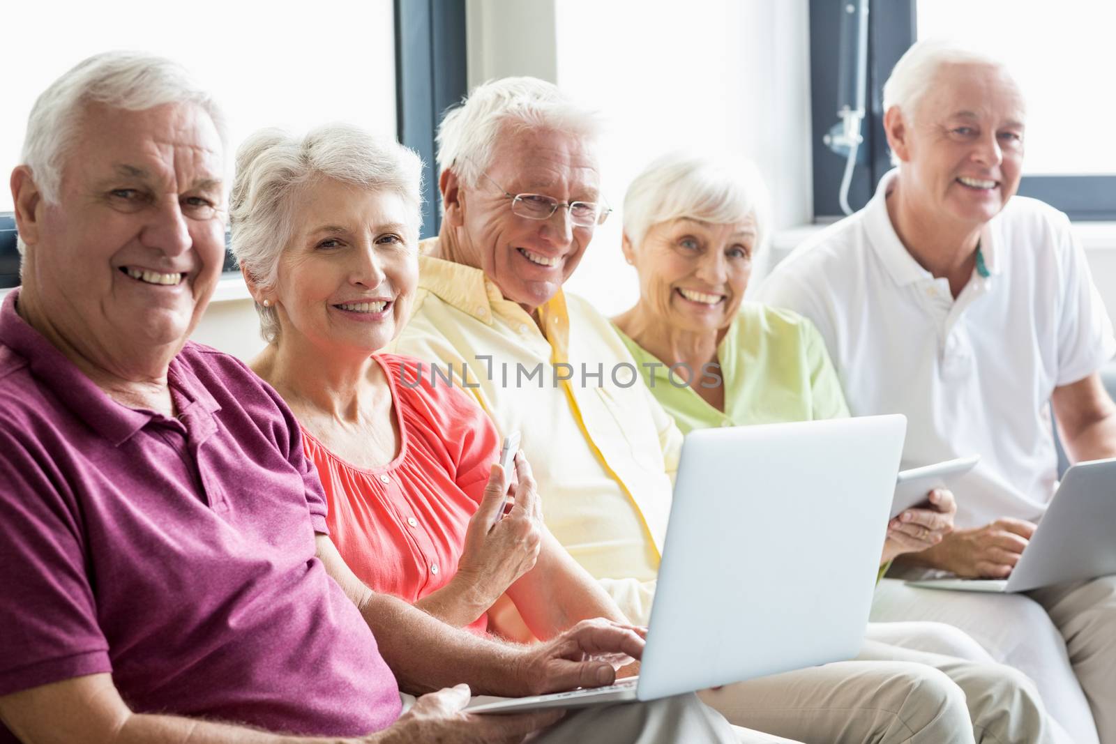 Seniors using technology by Wavebreakmedia
