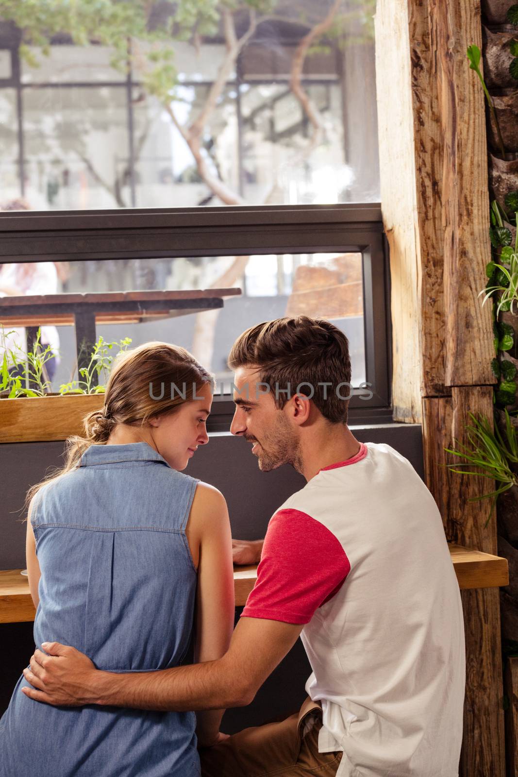 Photograph of a lovely couple in cafeteria