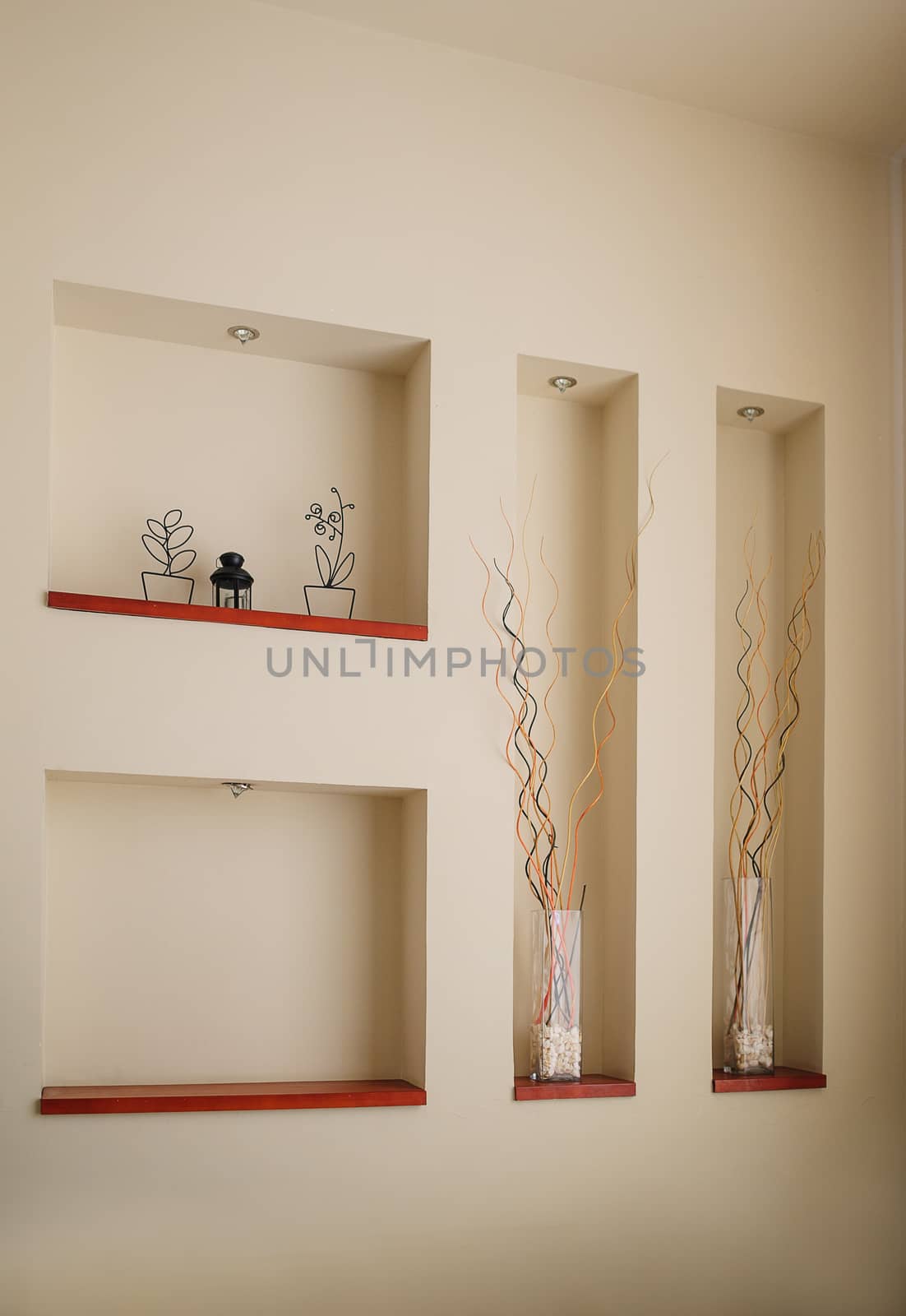 beautiful decorative vases and statues in the room by timonko