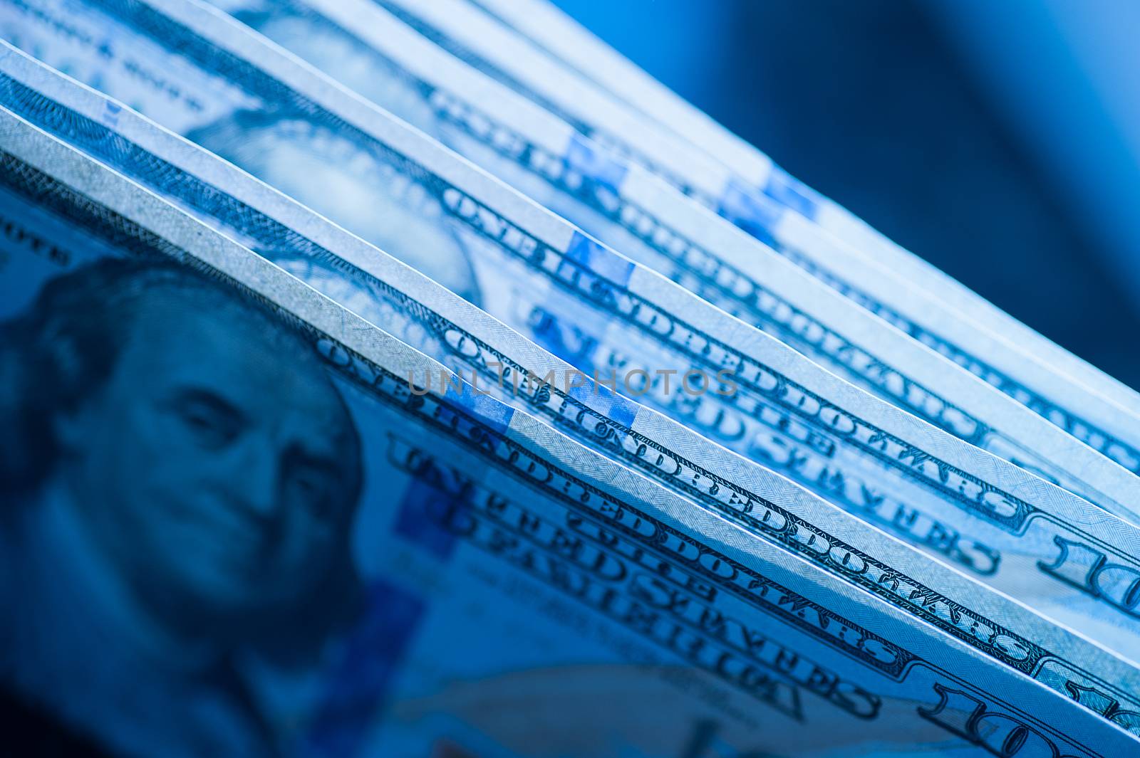 texture of dollar bills in blue tones by timonko