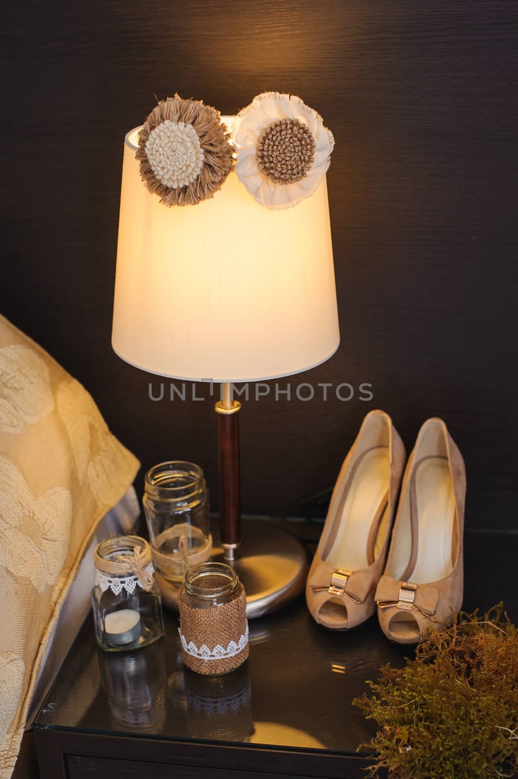 wedding decor and groom shoes on the table by timonko