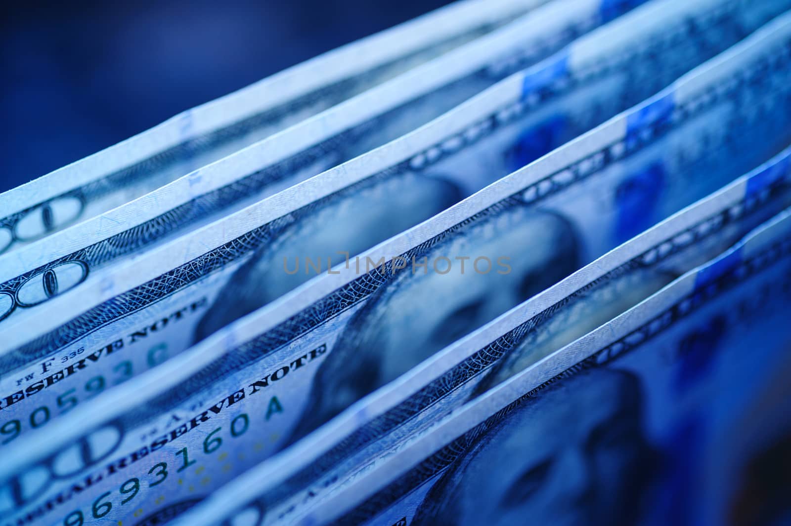 texture of dollar bills in blue tones.