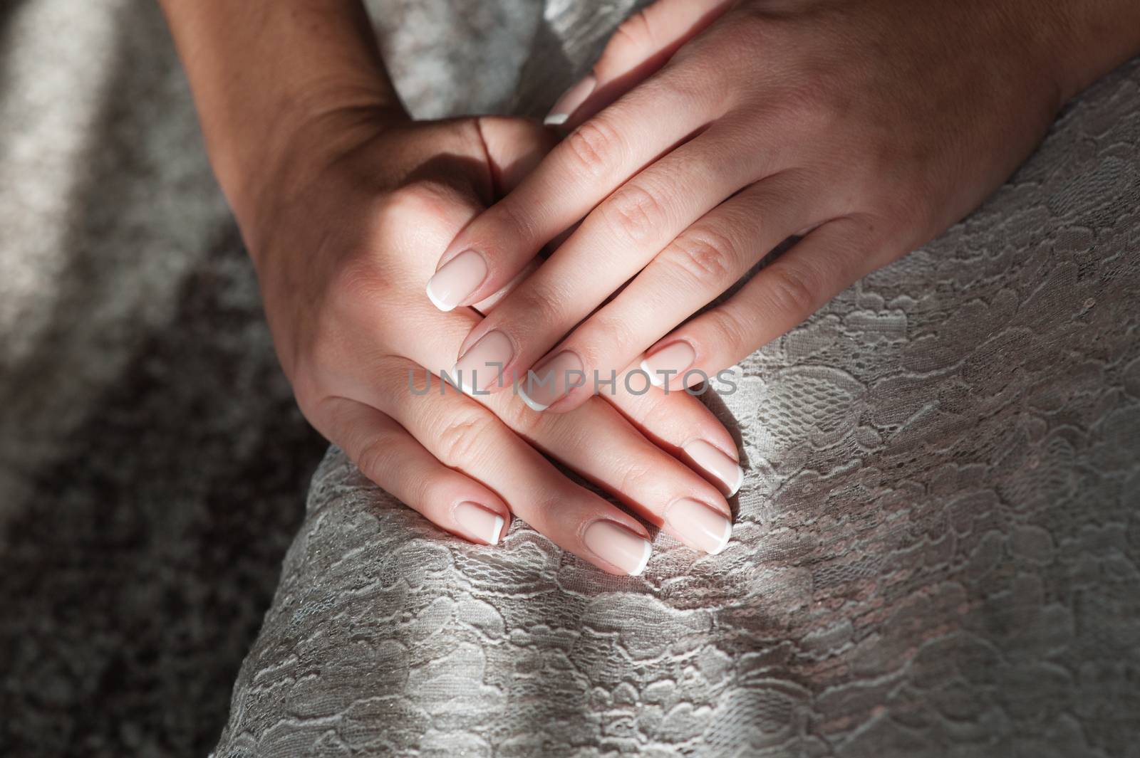 Female hands with manicure by timonko
